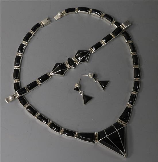 A stylish Mexican white metal and black onyx Art Deco style necklace, bracelet and pair of matching earrings.